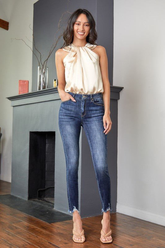 This is a jean you can dress up or dress down!  It is a little stretchy but super slimming.  A little more: High Rise Super Skinny Cut  Ankle Detail  Slightly Stretchy and Slimming   True to Size, If In Between - Size Down  9.5" Rise, 27.5" Inseam in size 3/25  91.9% Cotton, 7% Polyester, 1.1% Spandex